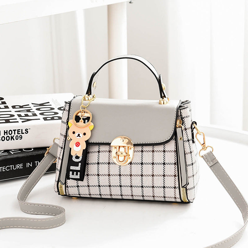 2025 new plaid contrasting color women's hand-held small square bag, cute pendant, sweet single shoulder crossbody bag, one piece hair replacement