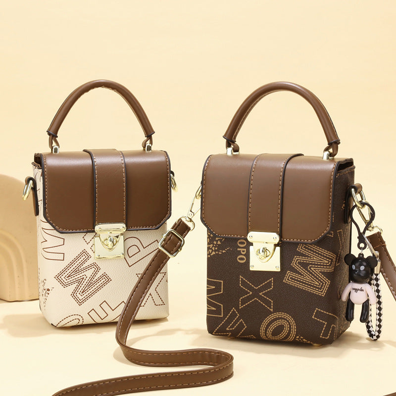 2025 new retro niche mini women's bag with simple letter printing, single shoulder handheld large capacity change phone bag