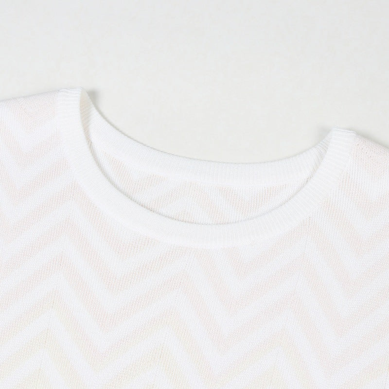 Elegant, high-quality Italian fashion dress with a round neckline, long sleeves, A-line cut, and wavy stripes, made from knitted fabric