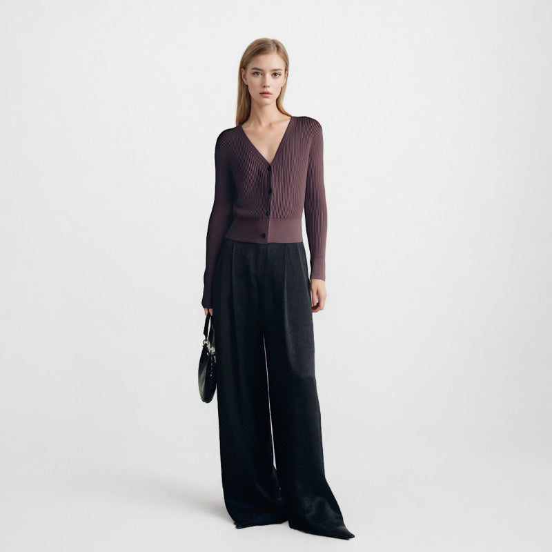 Elegant burgundy sweater with V-neck, long sleeves, and simple high-quality buttons