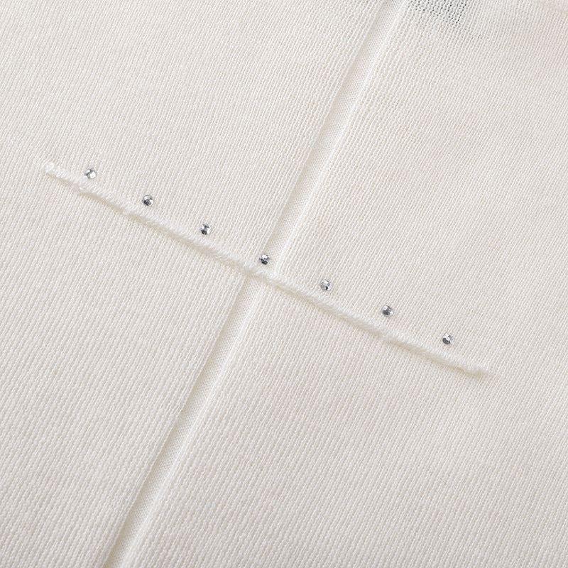 Elegant, high-quality sweater with a round neckline, slim fit, long sleeves, 100% wool, and rhinestone embellishments