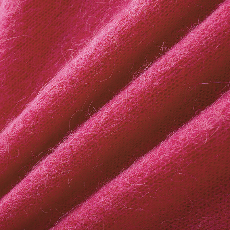 High-quality embroidered alpaca wool sweater with round neckline and long sleeves