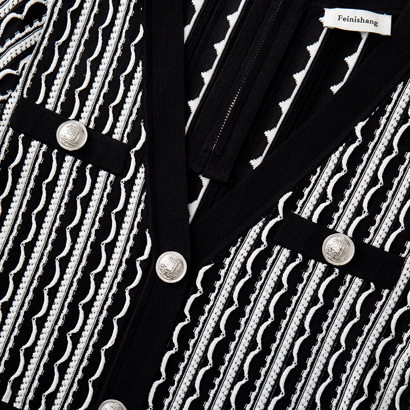 Elegant short-sleeved knit dress with V-neckline, mid-length, and simple buttons