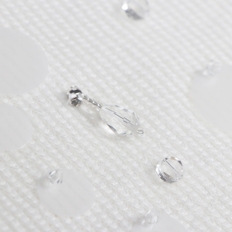 White JORYA vest with round neckline and bead embroidery, made of high-quality Tencel knit fabric