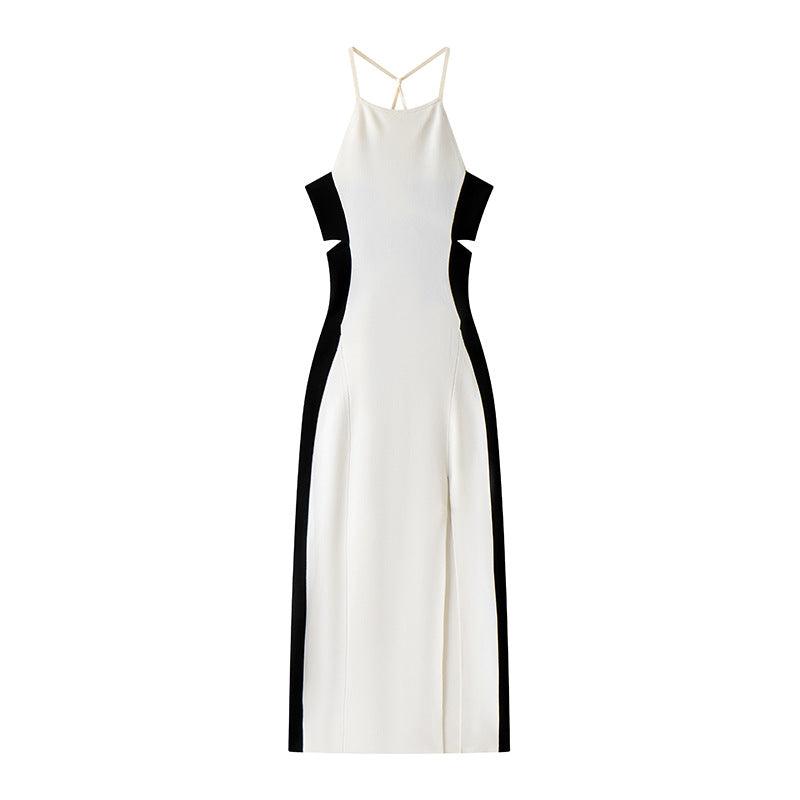 High-quality, elegant strapless, sleeveless knit dress with contrasting black and white patchwork, slimming slit, and mid-length.