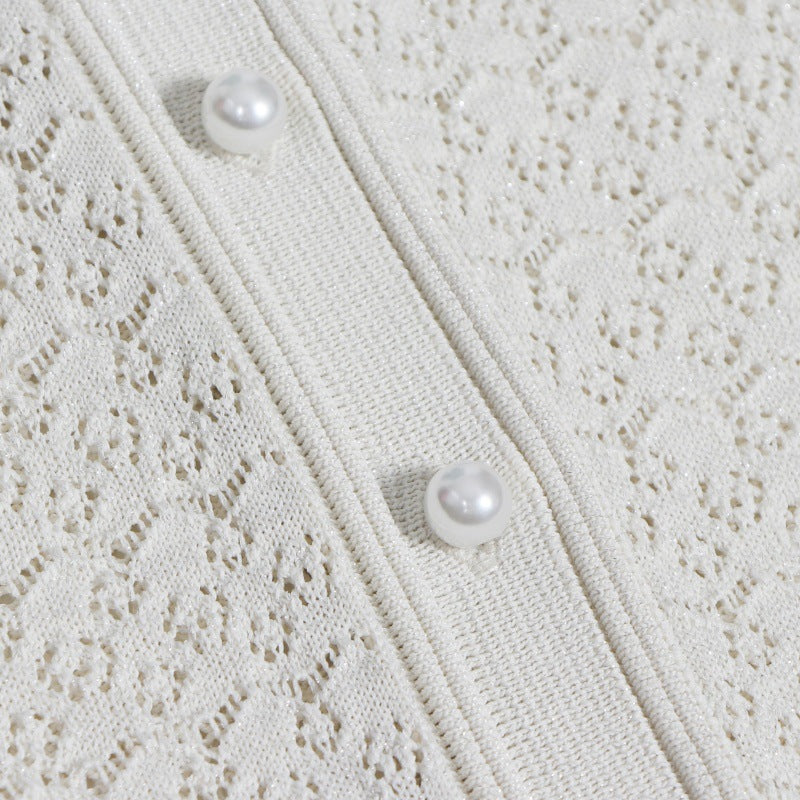 Elegant knit dress with round neckline, short sleeves, and mid-length with high-quality drawstring