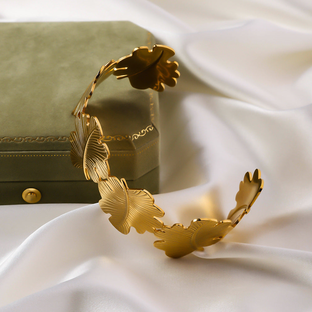 Stainless steel hydraulic opening bracelet cross-border European and American high-end feeling plated 18K gold women's retro exaggerated titanium steel bracelet