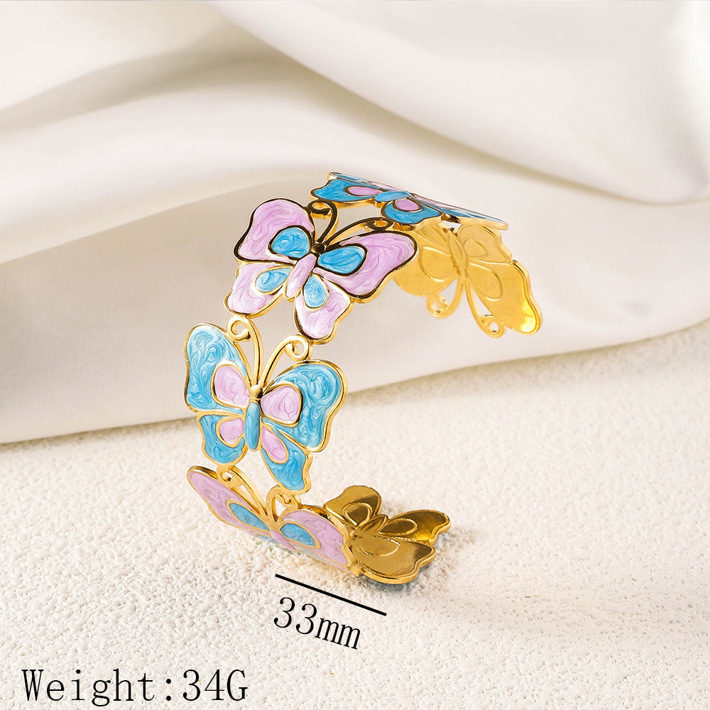 Cross border new stainless steel oil pressure painted open bracelet, exaggerated European and American women's plated 18K gold adjustable bracelet