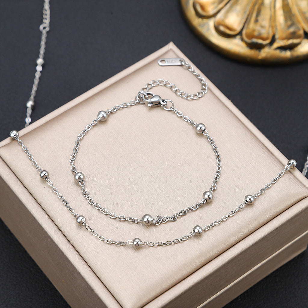 Stainless steel cross clip bead necklace bracelet set for women's fashionable collarbone necklace, elegant and versatile titanium steel bracelet