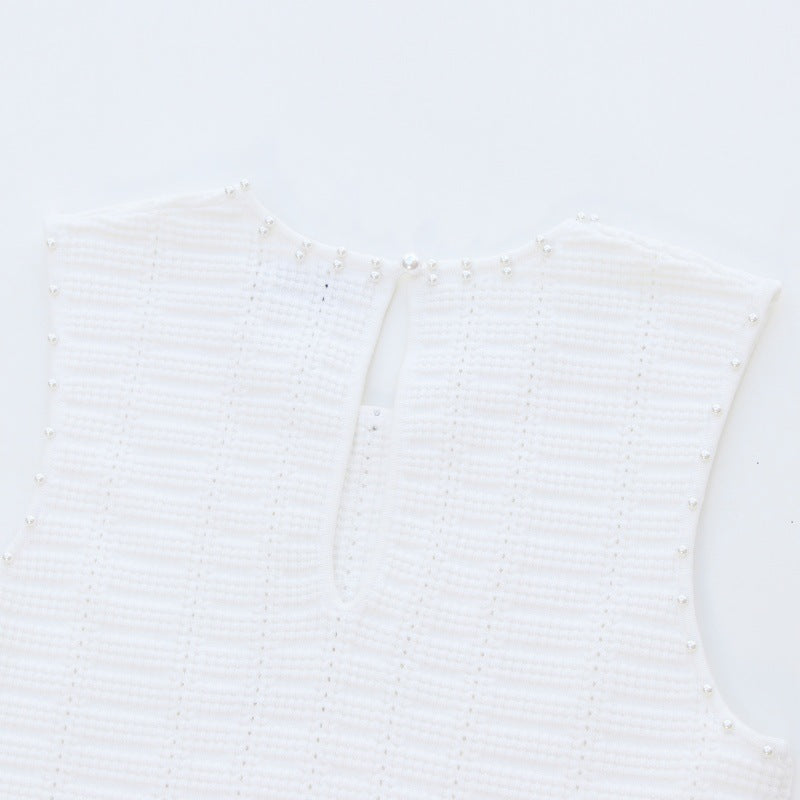 High-quality cotton knit dress with round neckline, sleeveless, with drawstrings and beads, knee length