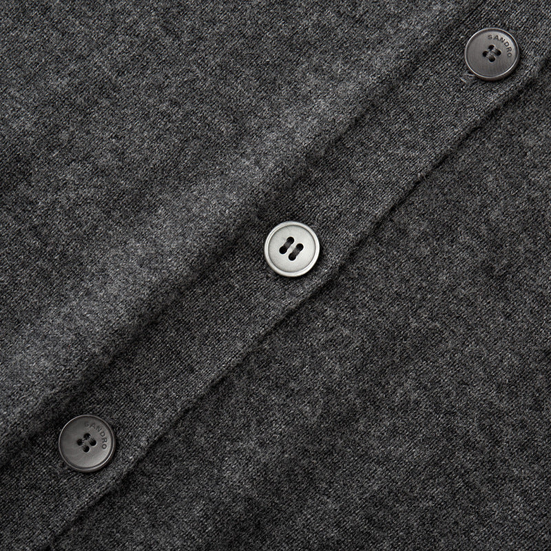 Stylish gray cardigan with round neckline, long sleeves made of cashmere wool with high-quality simple buttons