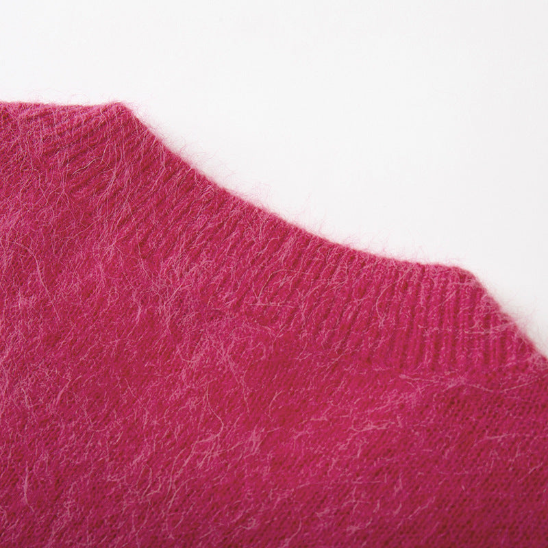 High-quality embroidered alpaca wool sweater with round neckline and long sleeves