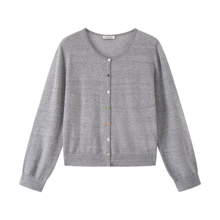 Lightweight knit jacket with a round neckline, long sleeves, and simple buttons, made from a high-quality wool and linen blend