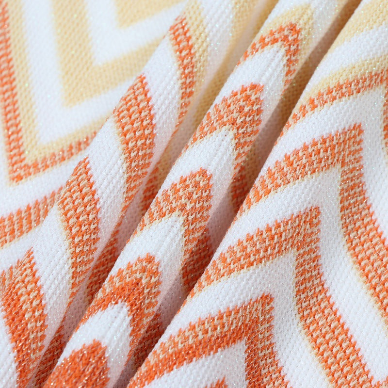 White Italian fashion dress with round neckline, short sleeves, mid-length, and wavy stripes in knit fabric