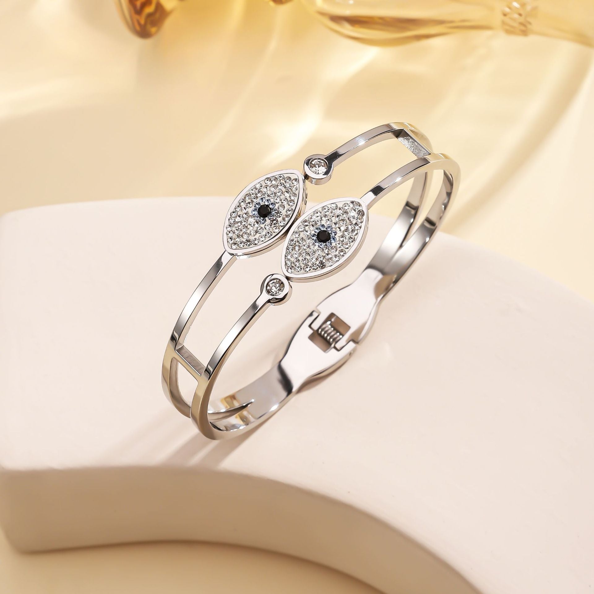 Cross border stainless steel spring bracelet, popular in Europe and America, Devil's Eye bracelet, personalized and high-end, open titanium steel bracelet