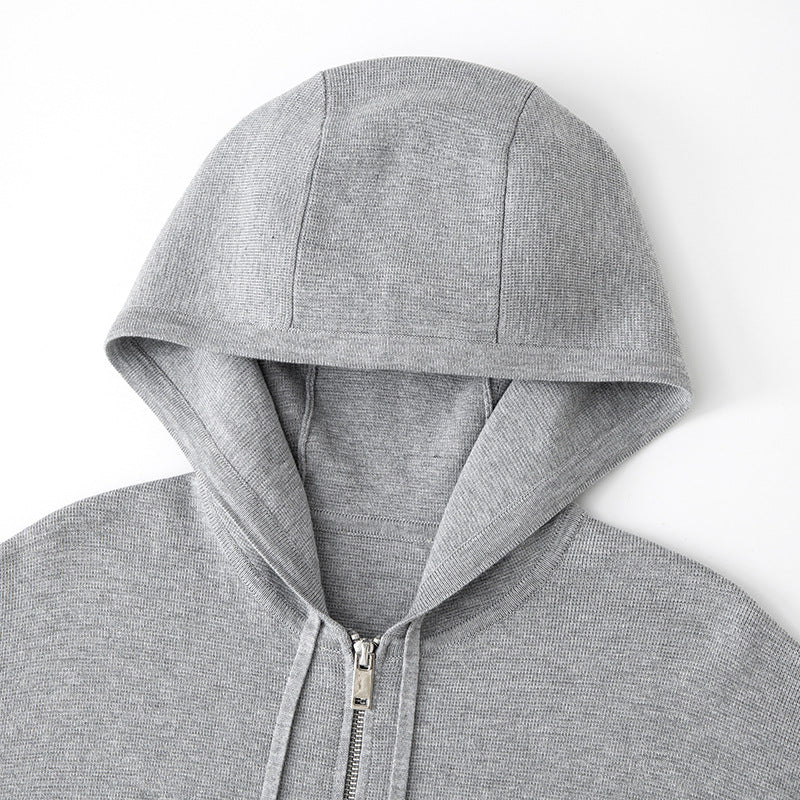 Stylish gray cardigan with hood, long sleeves, and zipper High-quality knit fabric