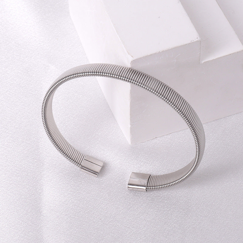 Cross border fashion stainless steel braided bracelet with high-end feel, no fading, versatile and open mouth jewelry wholesale