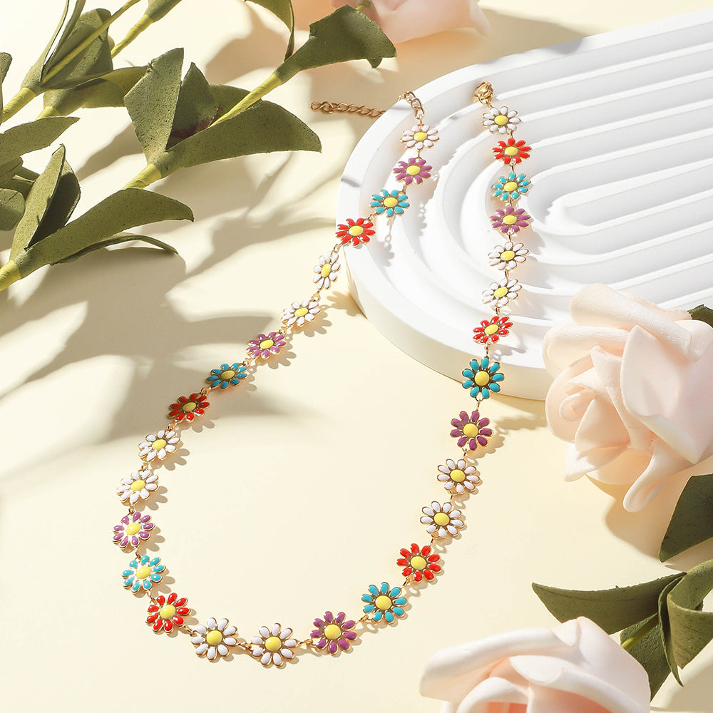 Cross border exclusive oil drop colored daisy pendant for Europe and America, stainless steel necklace, flower necklace, collarbone, titanium steel necklace