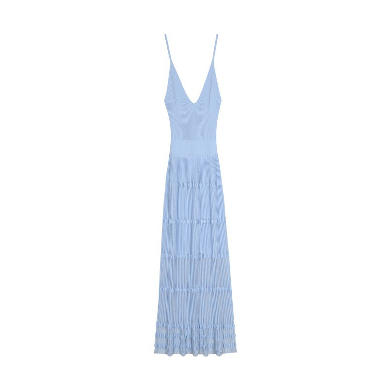 Elegant light blue sleeveless dress with V-neckline and A-line cut, made from high-quality knit fabric