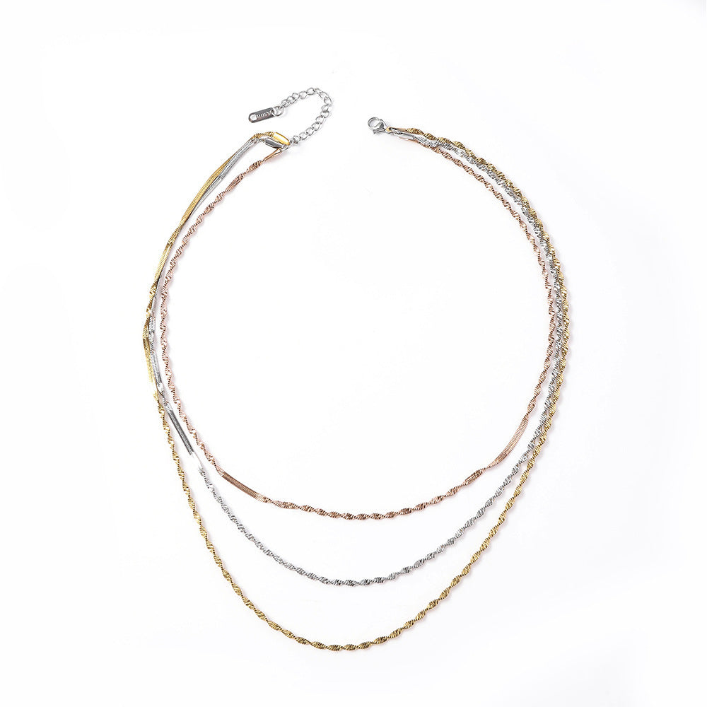 Stainless steel three-layer twisted push dense layered necklace for women, versatile plated 18K real gold lock bone chain ins titanium steel snake bone chain