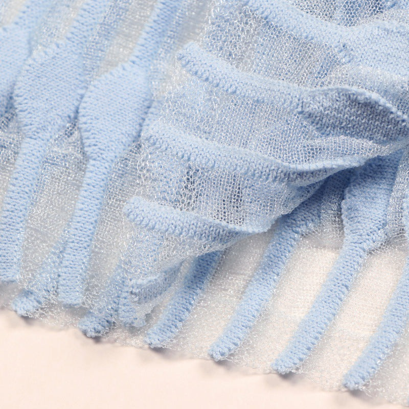 Elegant light blue sleeveless dress with V-neckline and A-line cut, made from high-quality knit fabric