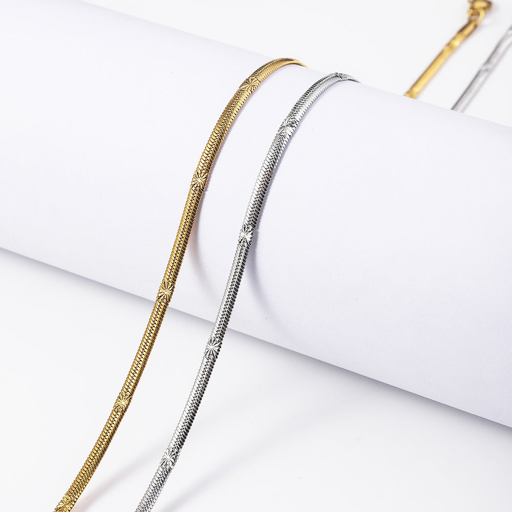 Cross border hot selling stainless steel embossed push button necklace for women, 18K real gold electroplated titanium steel batch flower push button chain in the furnace