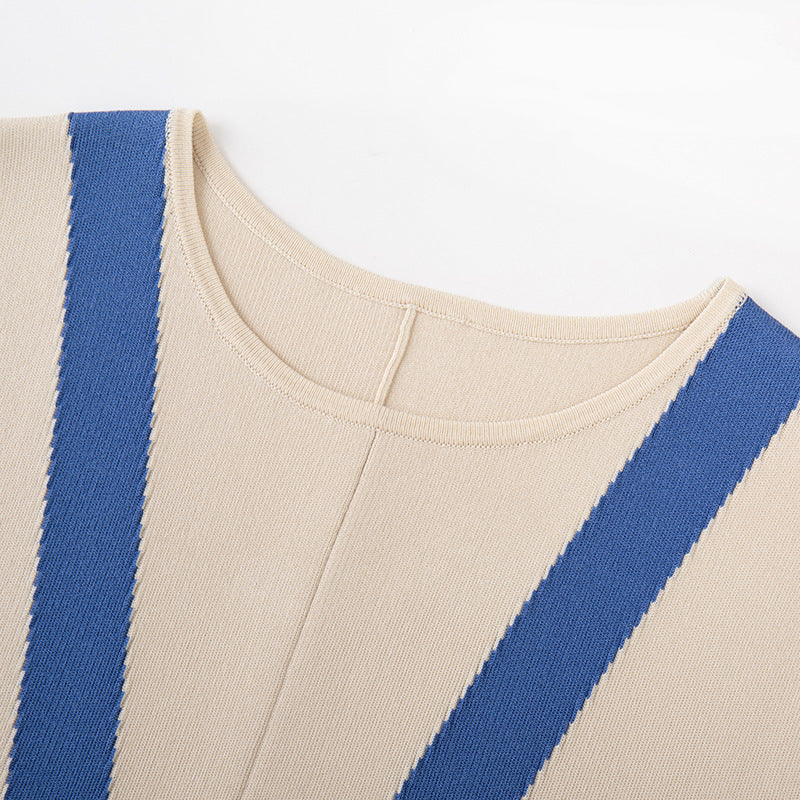 High-quality, elegant dress with a round neckline, sleeveless, in color blocks, and mid-length