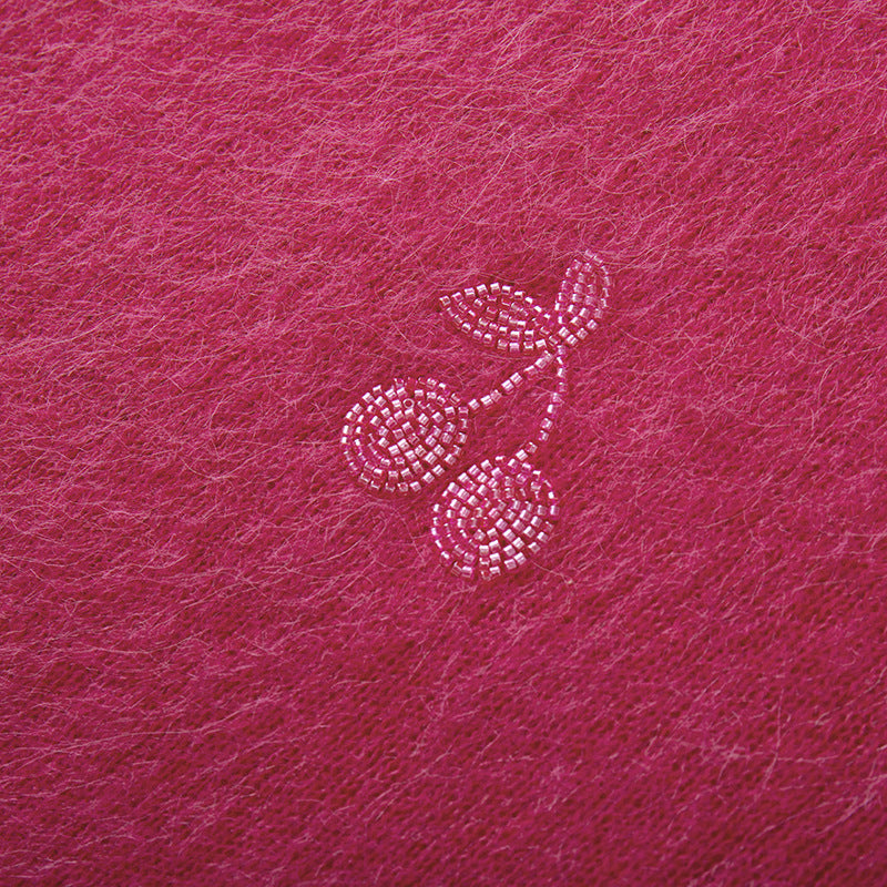 High-quality embroidered alpaca wool sweater with round neckline and long sleeves