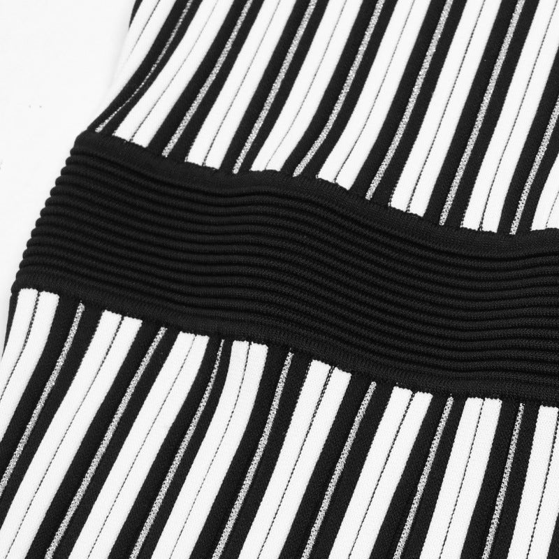 Knitted dress with round neckline, sleeveless and A-line cut, with high-quality black and white stripes