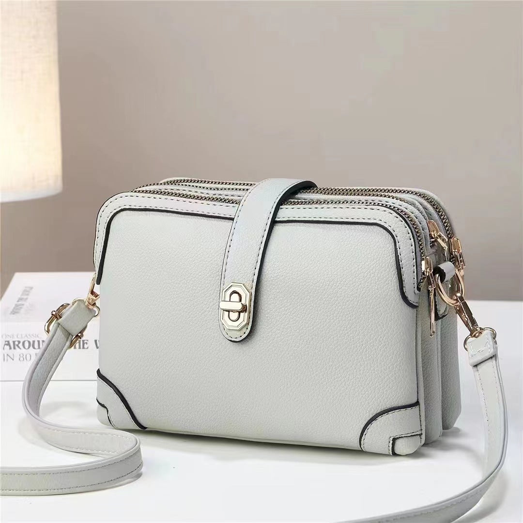 Bag for women 2025 new style fresh solid color large capacity multi pocket Korean version soft leather explosive single shoulder diagonal cross small square bag