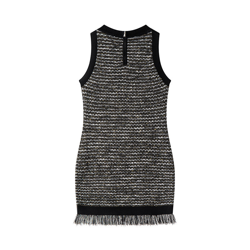 Elegant sleeveless knit dress with fringes and a round neckline in French fashion style