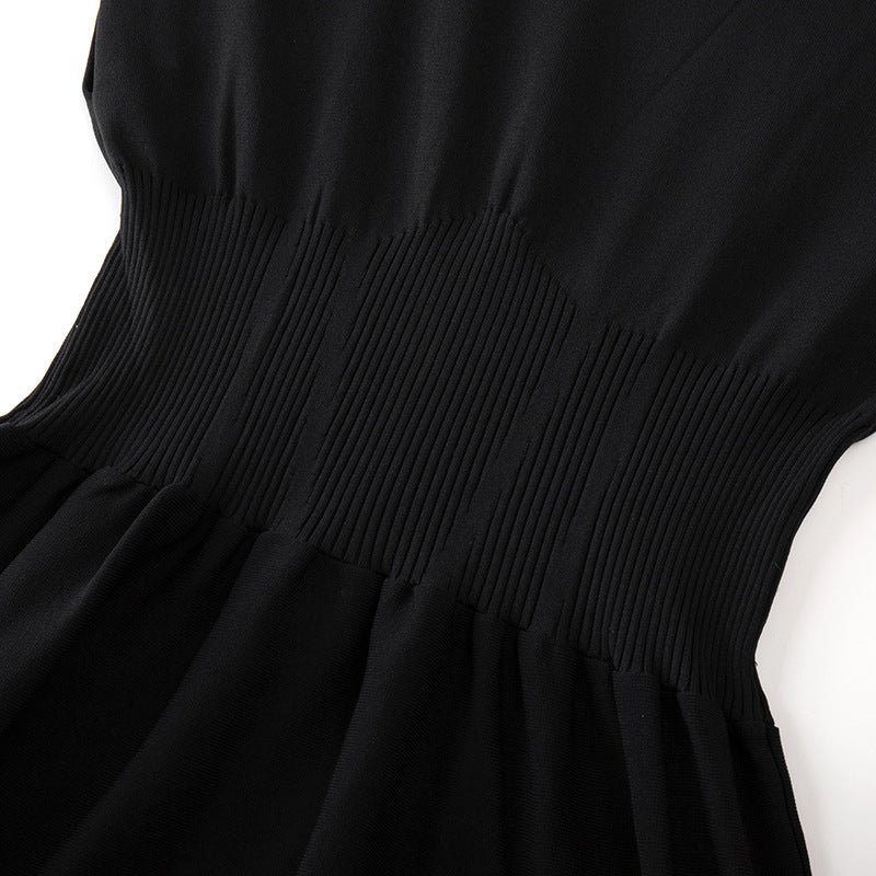 Elegant and simple black dress with a round neckline, fitted waist, stretch fabric, and short sleeves, made from high-quality knit fabric