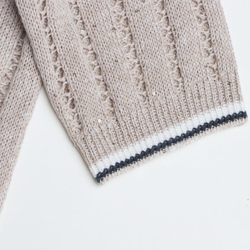 Elegant sweater with round neckline, short sleeves with linen bow and beads High-quality pullover