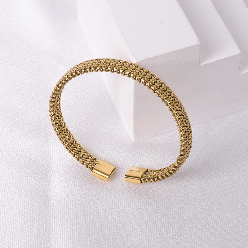 Cross border fashion stainless steel braided bracelet with high-end feel, no fading, versatile and open mouth jewelry wholesale