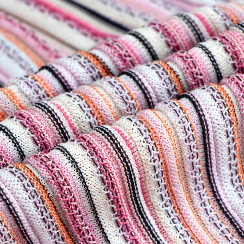 Sophisticated Italian-style striped knit dress with a round neckline, sleeveless, mid-length, high quality