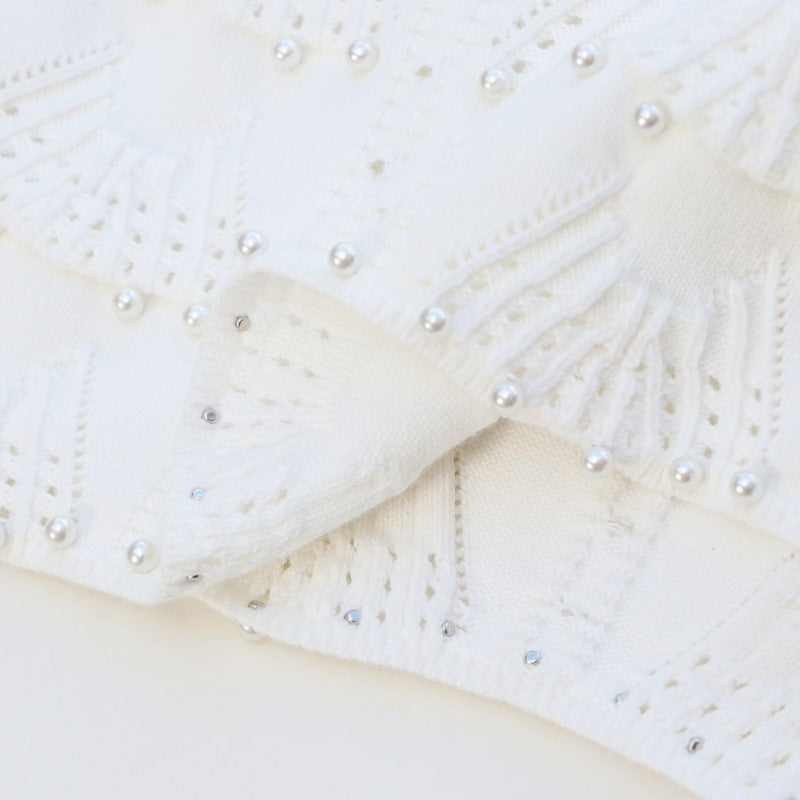 High-quality cotton knit dress with round neckline, sleeveless, with drawstrings and beads, knee length