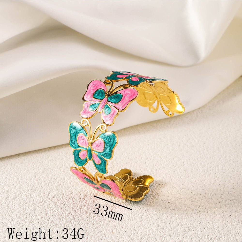 Cross border new stainless steel oil pressure painted open bracelet, exaggerated European and American women's plated 18K gold adjustable bracelet