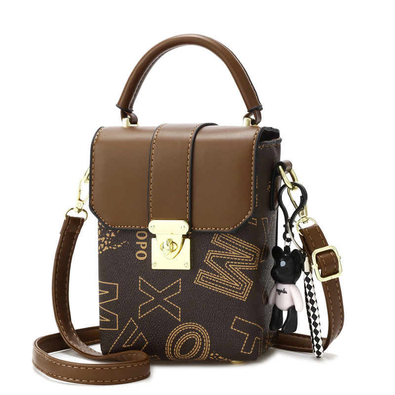 2025 new retro niche mini women's bag with simple letter printing, single shoulder handheld large capacity change phone bag