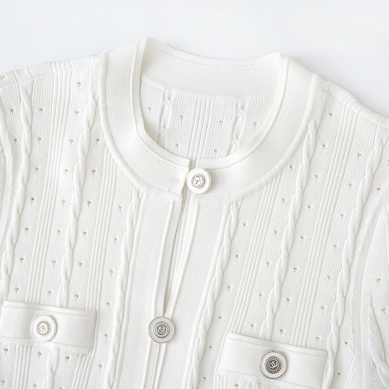 High-quality, elegant French-style dress with a round neckline, short sleeves, simple buttons, longer hem, and lace trim