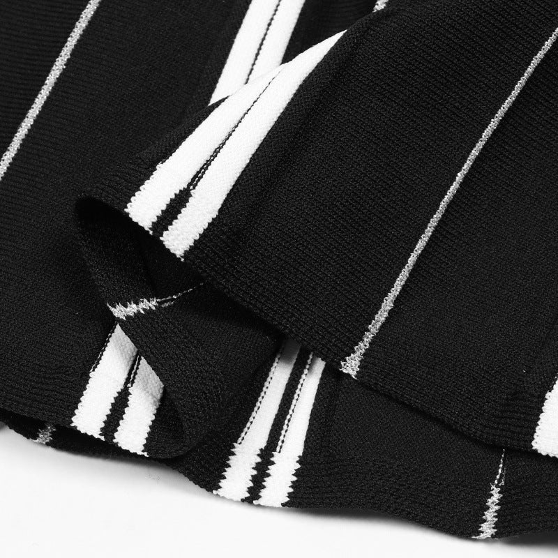 Knitted dress with round neckline, sleeveless and A-line cut, with high-quality black and white stripes