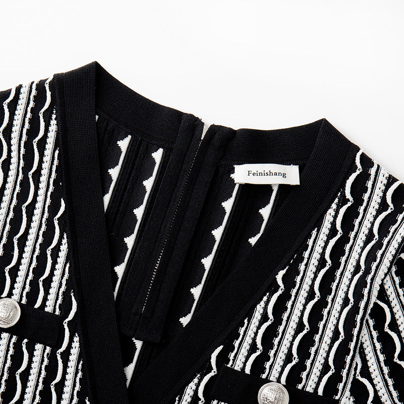 Elegant short-sleeved knit dress with V-neckline, mid-length, and simple buttons