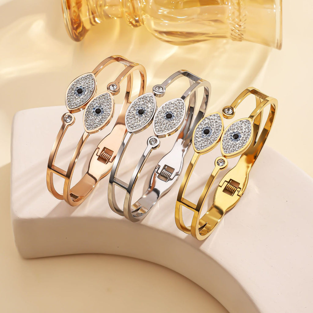 Cross border stainless steel spring bracelet, popular in Europe and America, Devil's Eye bracelet, personalized and high-end, open titanium steel bracelet