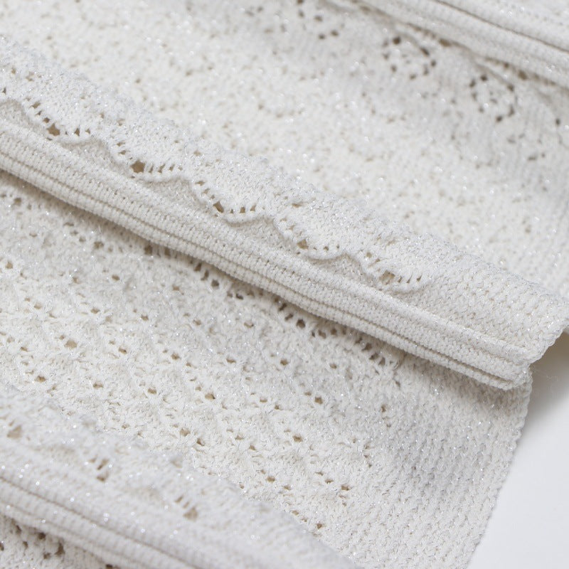 Elegant knit dress with round neckline, short sleeves, and mid-length with high-quality drawstring