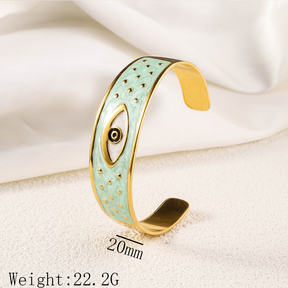 Cross border new stainless steel oil pressure painted open bracelet, exaggerated European and American women's plated 18K gold adjustable bracelet