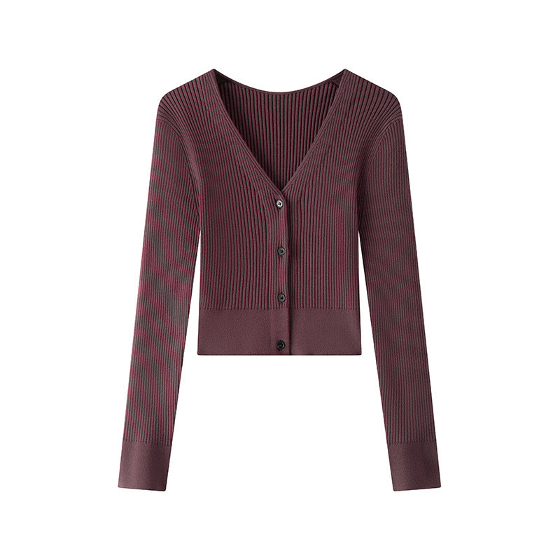 Elegant burgundy sweater with V-neck, long sleeves, and simple high-quality buttons