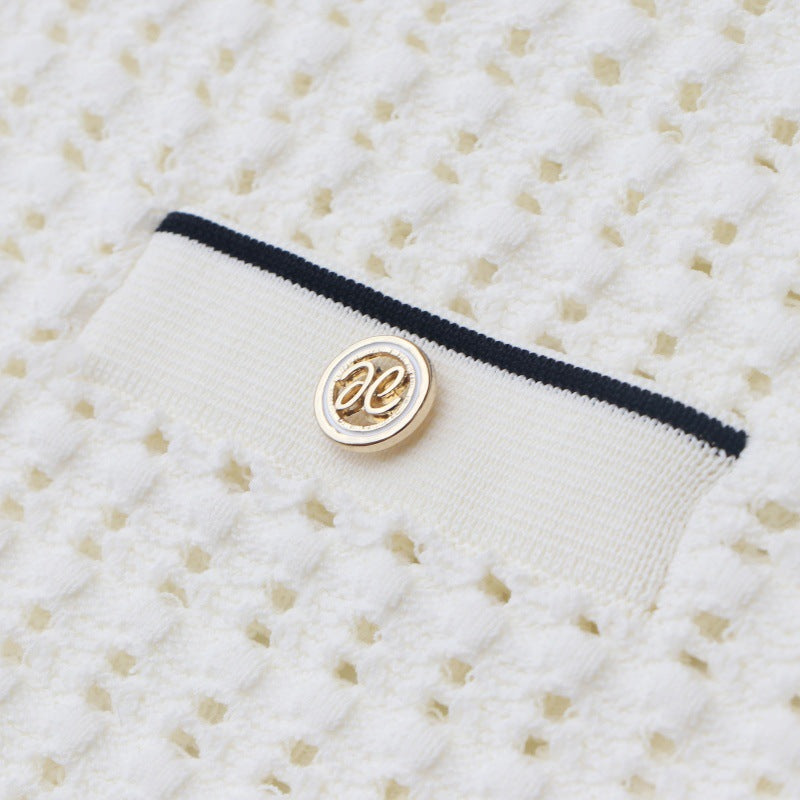 High-quality, elegant knit dress with a round neckline, short sleeves, lace details, and mid-length hem