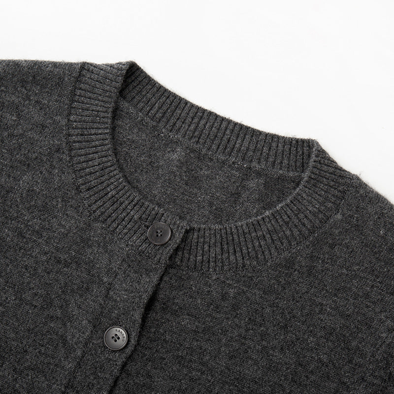 Stylish gray cardigan with round neckline, long sleeves made of cashmere wool with high-quality simple buttons