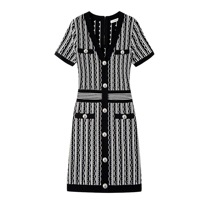 Elegant short-sleeved knit dress with V-neckline, mid-length, and simple buttons