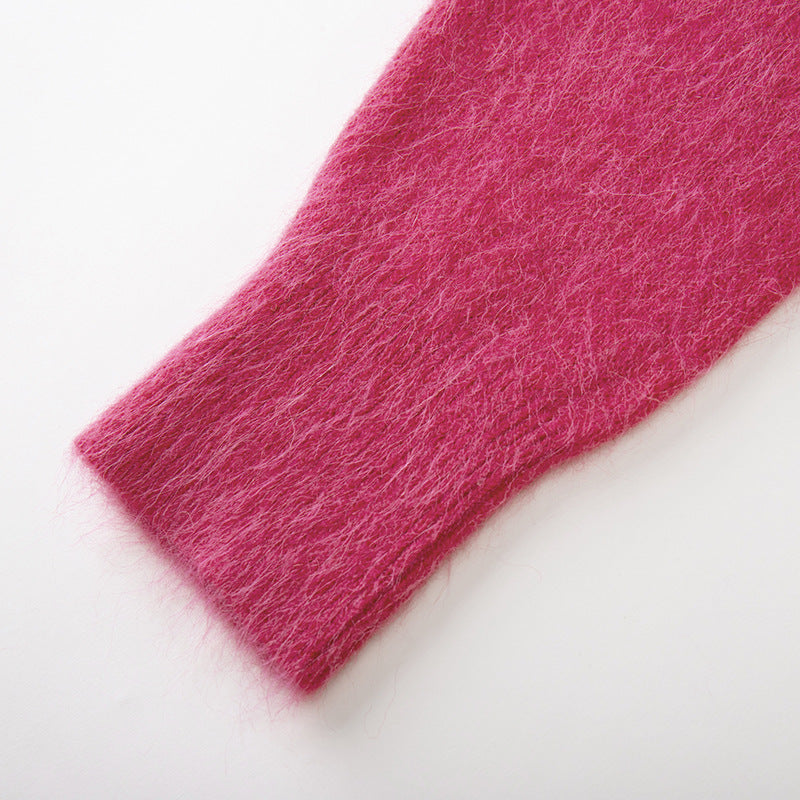 High-quality embroidered alpaca wool sweater with round neckline and long sleeves