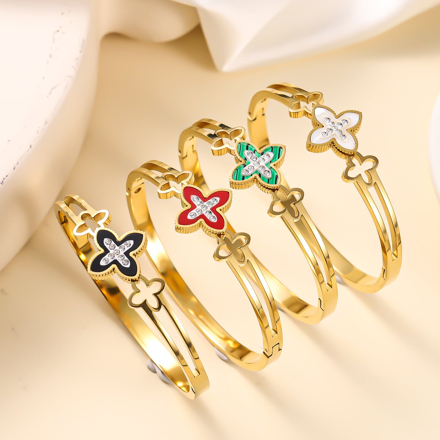 Titanium steel four leaf flower bracelet cross-border hot selling women's diamond inlaid colorful bracelet plated 18K gold fashionable stainless steel bracelet